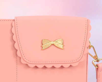 Gold bow purse charm