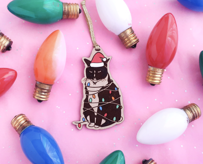 Disgruntled cat Christmas ornament